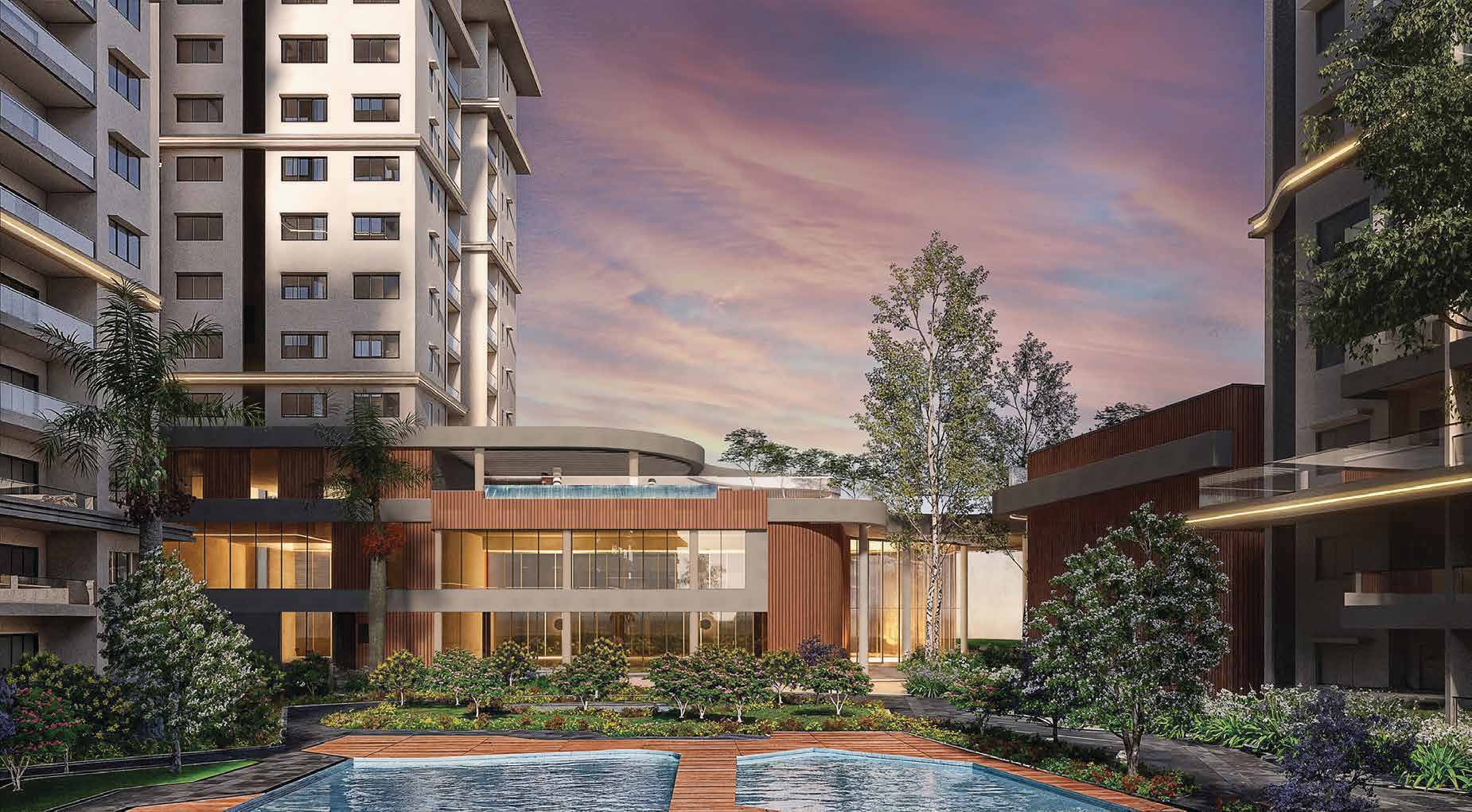 Architectural rendition of the clubhouse and pool deck at dusk